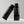 Two black bottles labelled as Mr Jones Shampoo and Conditioner